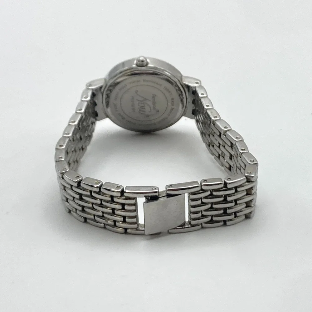Armitron Now Women's Watch 28mm Silver Tone Crystals MOP Dial New Battery 6.75